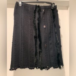 Black Gucci rabbit trimmed skirt.